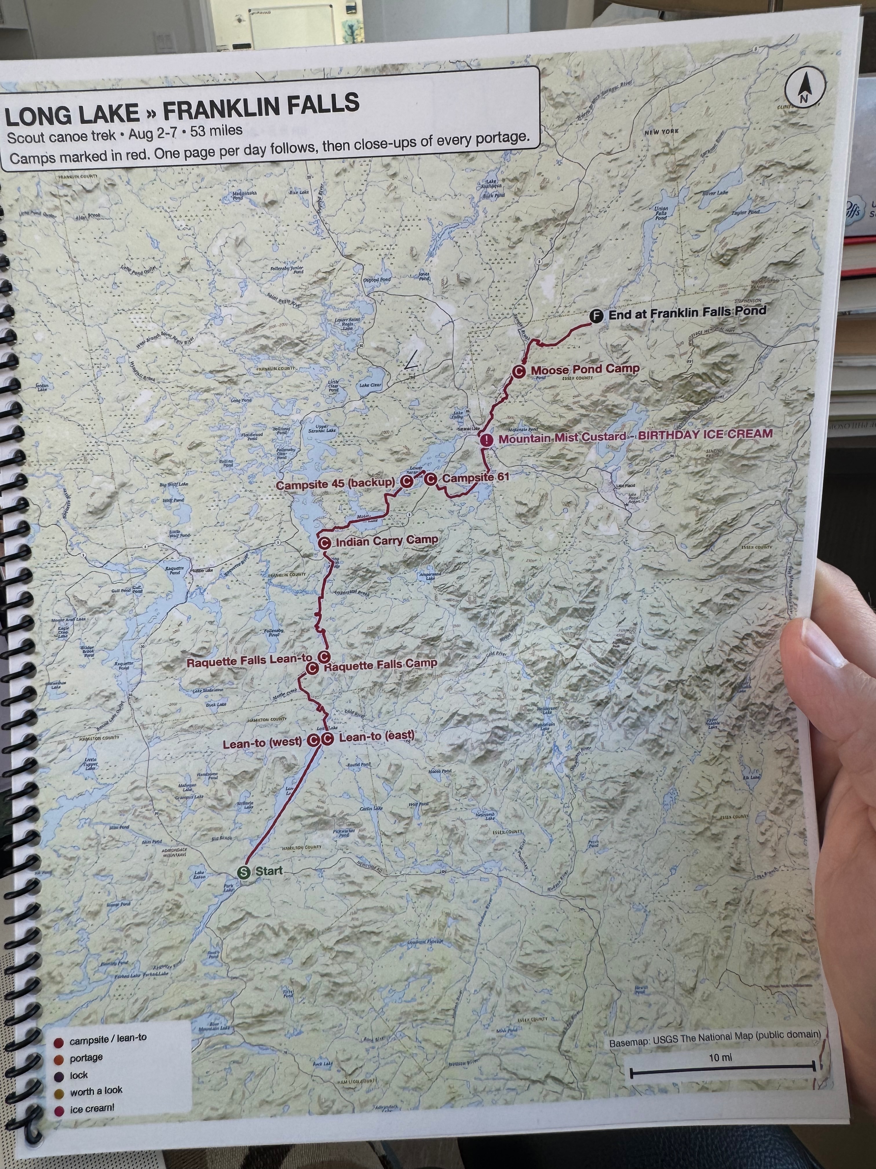 The finished book: spiral-bound, waterproof, one overview page up front