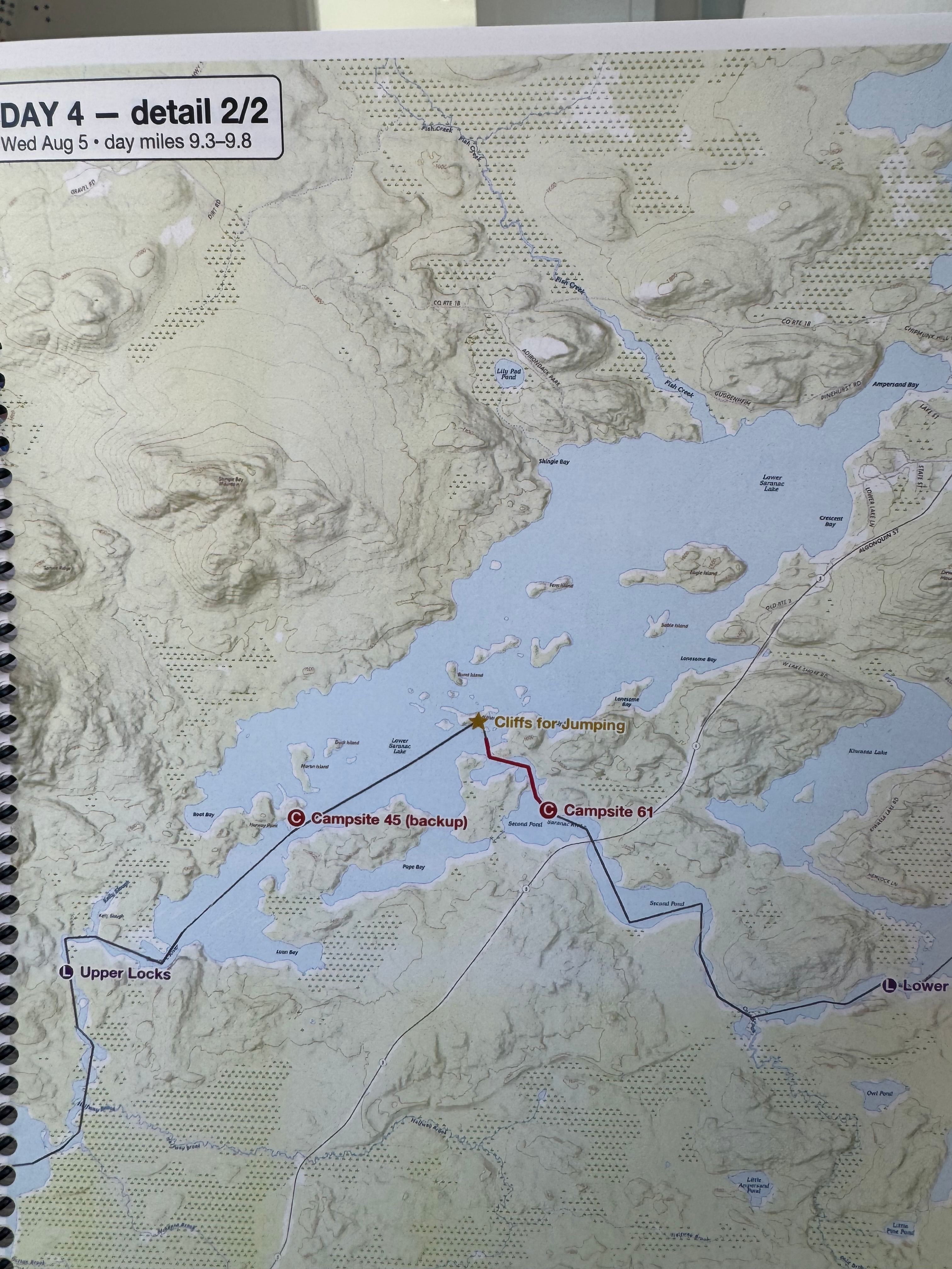 Day 4, detail page — Lower Saranac Lake, with the backup campsite and the jumping cliffs marked